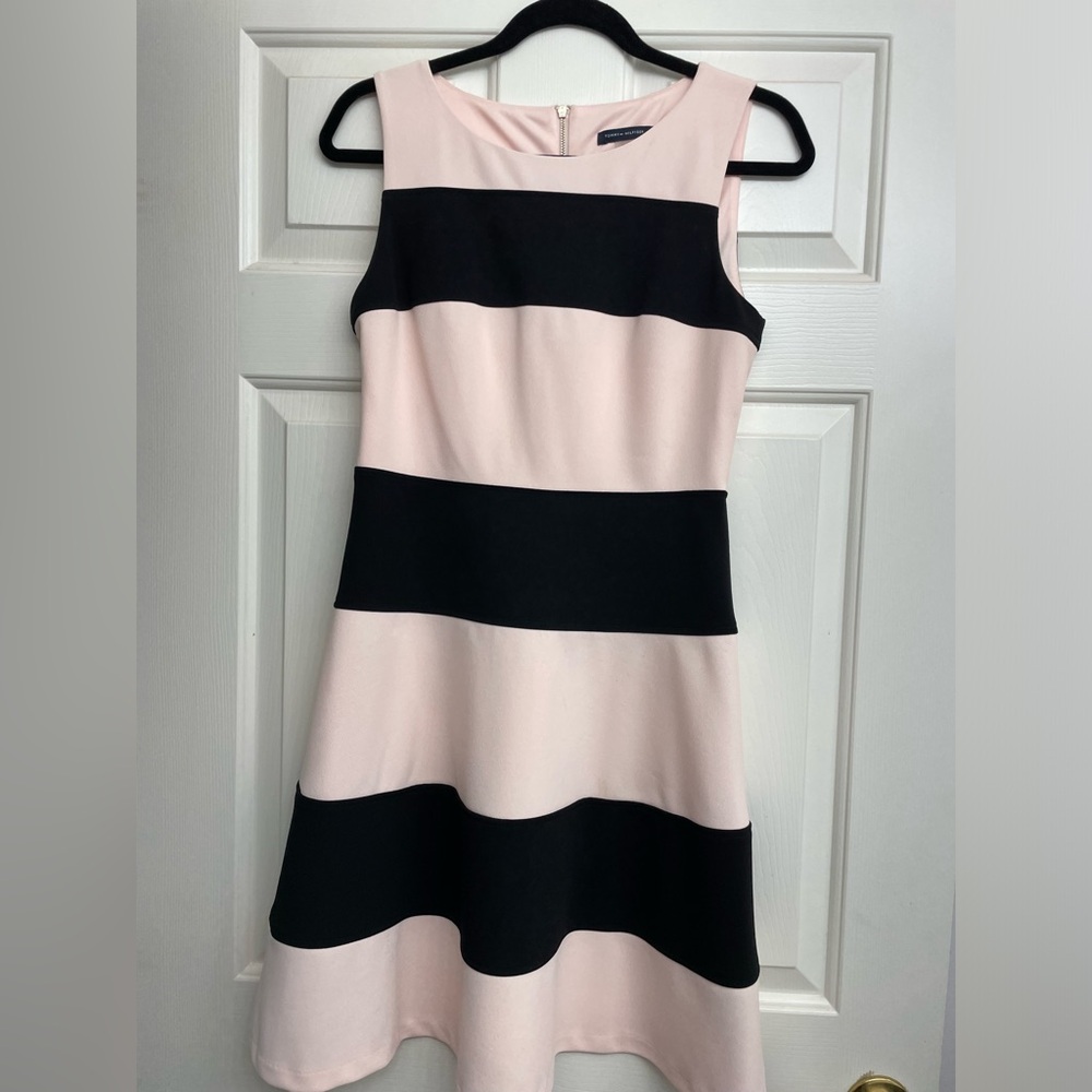 Super cute pink and black Tommy Hilfiger dress. Fun flowy and flattering.